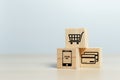 Concept of online shopping. wooden cube blocks with shopping or e-commerce icons on table. business online marketing Royalty Free Stock Photo