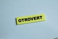 Concept of otrovert write on sticky notes isolated on Wooden Table. For personality traits, identity and individuality Royalty Free Stock Photo