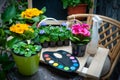 Concept paint the world with colors, garden multicolored flowers and a palette