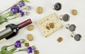 The concept of the Passover holiday. Pesah. top view of matzah, silver glasses with red wine, a bottle of wine, walnuts