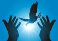 Peace symbol with joined hands releasing a birdÃ¢â¬â¢s flight at sunset. Royalty Free Stock Photo