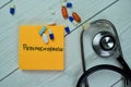 Concept of Perimenopause write on sticky notes with stethoscope isolated on Wooden Table