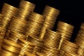 Concept photo.Coins close-up on the table. A lot of coins, selective focus.Front view of stacks of Euro coins.Simple and