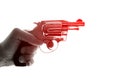 Concept photo of a gun in hand Royalty Free Stock Photo