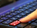 Danger online internet dark web user finger pressing pushing red button computer