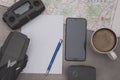 Notepad, drone, smartphone and cup of coffee for plan your drone flight