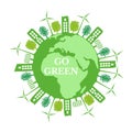 Concept of planet earth with green city, green trees and renewable energy sources. Ecology concept and environment