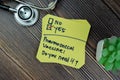 Concept of Pneumococcal Vaccine. Do you need it? Yes write on sticky notes isolated on Wooden Table