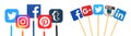 Concept of Popular Social Media paper icons, such Facebook, Pinterest, Tumblr, Instagram, Twitter, with color pencils and wooden