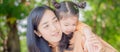 Concept portrait lifestyle Asian beautiful mother and daughter cheerful child,hugging love and happiness,activity in family enjoy Royalty Free Stock Photo