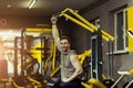 Muscular man working out in gym doing exercises Royalty Free Stock Photo