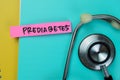 Concept of Prediabetes write on sticky notes with stethoscope isolated on Wooden Table