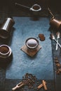 Concept - preparing of coffee. Coffee cup, mocha, coffee maker, roasted beans, spoons, turkisch cezve, biscuits and cardamom. Coff Royalty Free Stock Photo