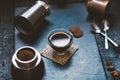 Concept - preparing of coffee. Coffee cup, mocha, coffee maker, roasted beans, spoons, turkisch cezve, biscuits and cardamom. Coff Royalty Free Stock Photo