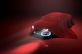 Concept of presentation of the car under a red cloth in a darck red studio 3d rendering Illustration Royalty Free Stock Photo