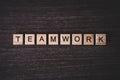 Concept presented by crossword with words teamwork with wooden c Royalty Free Stock Photo