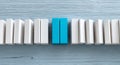 The concept of problem solving and intervention is represented by blue blocks stopping the fall of white blocks Royalty Free Stock Photo