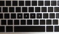 Concept of problems of today internet. Hate caption isolated on notebook keyboard with blank keys Royalty Free Stock Photo