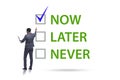 Concept of procrastination with now or later Royalty Free Stock Photo