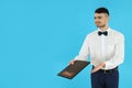 Concept of profession with young man waiter Royalty Free Stock Photo