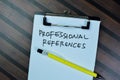 Concept of Professional References write on paperwork isolated on Wooden Table