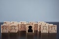 Concept of racism and misunderstanding between people, prejudice and discrimination. Wooden block with a white people figures and