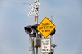 High speed train warning sign at railroad crossing. Royalty Free Stock Photo