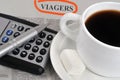 French life annuity concept with cup of coffee and calculator Royalty Free Stock Photo