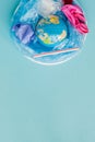 The concept of reducing plastic bags use: Modeled globes are sunk in many white plastic bags. Meaning, plastic bags are about to Royalty Free Stock Photo