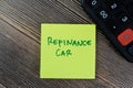 Concept of Refinance Car write on sticky notes isolated on Wooden Table Royalty Free Stock Photo