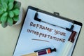 Concept of Reframe Your Interpretations write on paperwork isolated on Wooden Table Royalty Free Stock Photo