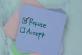 Concept of Refuse or Accept write on sticky notes isolated on Wooden Table