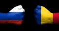 Concept of relations/conflict between Romania and Russia symbolized by two opposed clenched fists