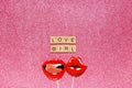 Concept of relationship between women, flatlay overhead top photo stand props lips letter love girls on pink shiny background copy