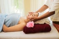 Concept relaxation and health spa. asian young woman getting spa face massage. facial beauty treatment in spa salon Royalty Free Stock Photo