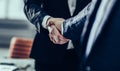 Concept of a reliable partnership : a handshake of business part Royalty Free Stock Photo