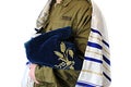 Concept: Religion in army of Israel. Religious soldier with a Tzitzit on his shoulders and bag Tallit on a white background Royalty Free Stock Photo