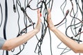 Communications. Wires and hands. Royalty Free Stock Photo