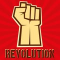 Concept of revolution. Hund up on red background,