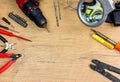 Concept Right to Repair, image showing tools repairing domestic switch under magnification with various tools. Room for text