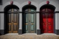 A Row Of Doors Sitting Next To Each Other On A Building. Generative AI Royalty Free Stock Photo