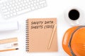 Concept SAFETY DATA SHEETS SDS. Top viwe of modern workplace w