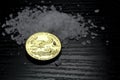 Concept: salt and gold. Gold coin American Eagle 1 ounce compared to salt as a value of life. Royalty Free Stock Photo