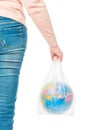 Concept of save earth from plastic waste pollution. Young woman hands holding an earth globe in a plastic Royalty Free Stock Photo