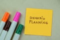 Concept of Scenario Planning write on sticky notes isolated on Wooden Table