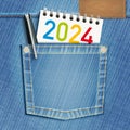 The year 2024 represented on a notepad with a fountain pen in the pocket of a jeans Royalty Free Stock Photo