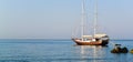 concept of sea voyage, seaside panorama with a ship against a clear blue sky