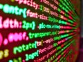 Concept of security, programming and hacking, deep decryption and encryption. Minificated web development javascript code close up Royalty Free Stock Photo