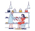Concept Of Shopping In Footwear Store. Shop Assistant Helps To Choose And Try on Shoes To Woman in Footgear Store