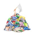 The concept of shopping. Sticking out of a pile of clothes a han Royalty Free Stock Photo
